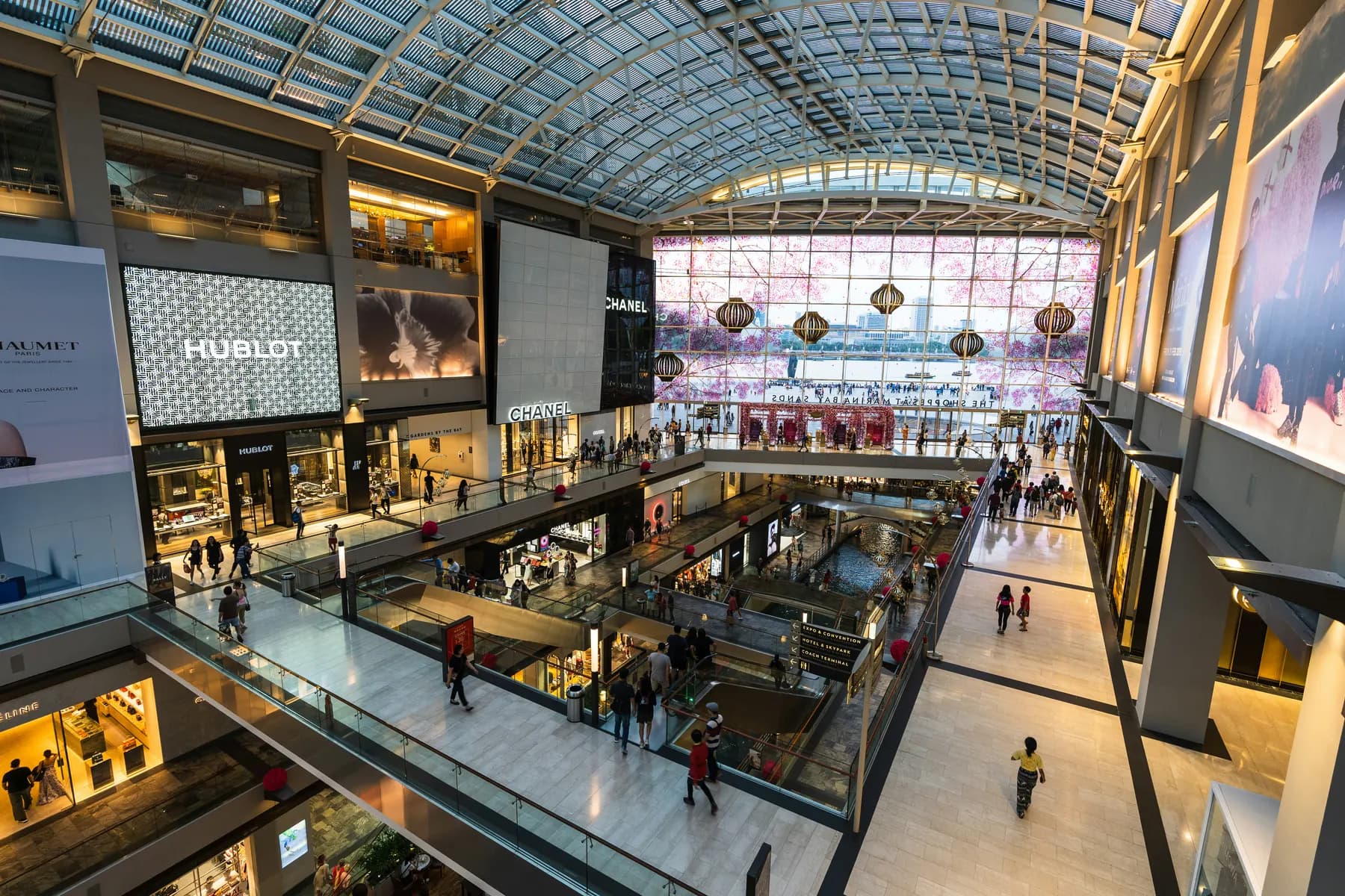 Bright multi-level retail shopping center interior