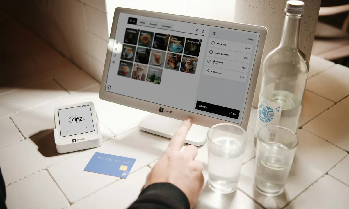Touchscreen point-of-sale terminal on a restaurant counter